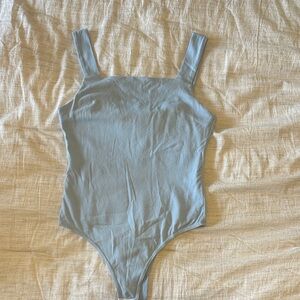 Light blue body suit